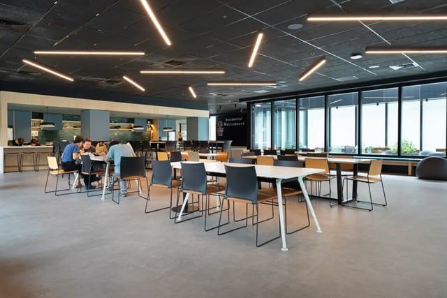 Tables chairs students in common area at Mayoral Drive Student Accommodation in Auckland Student Accommodation