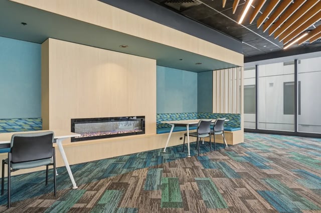 Fireplace benches and tables student common area at Mayoral Drive Student Accommodation in Auckland Student Accommodation