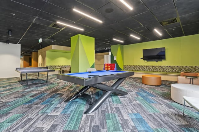 Pool table foosball table ping pong table living area at Mayoral Drive Student Accommodation in Auckland Student Accommodation