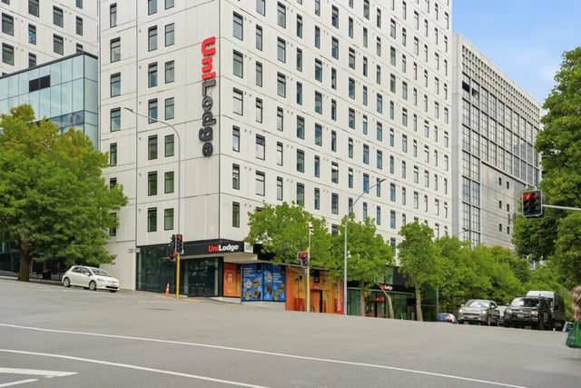 UniLodge building with cars on street Exterior at Mayoral Drive Student Accommodation in Auckland Student Accommodation