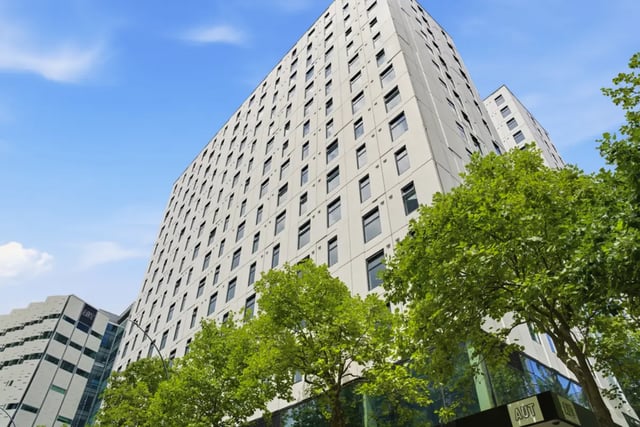 Modern tall building with many windows exterior at Mayoral Drive Student Accommodation in Auckland Student Accommodation