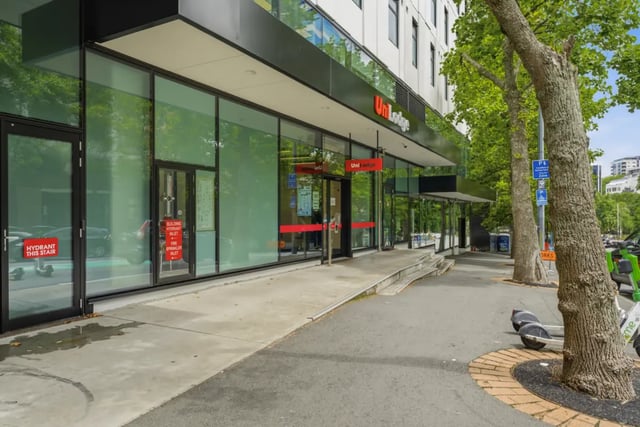 Glass building entrance with UniLodge signage exterior at Mayoral Drive Student Accommodation in Auckland Student Accommodation