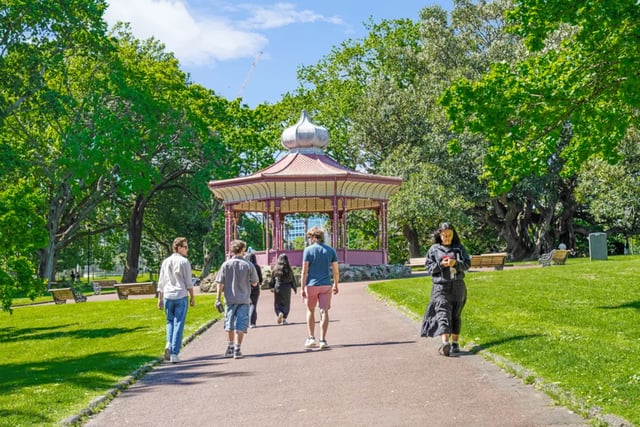People walking in park with gazebo exterior at Mayoral Drive Student Accommodation in Auckland Student Accommodation