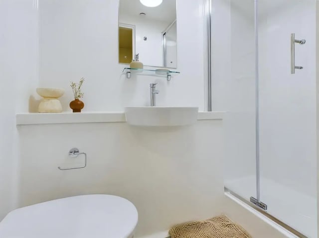 Toilet sink shower with glass door bathroom at Sheares Hall in Newcastle Upon Tyne Student Accommodation