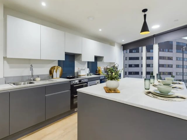 Modern kitchen with island and window view kitchen at Sheares Hall in Newcastle Upon Tyne Student Accommodation