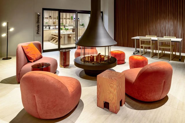 Modern lounge area with fireplace and seating Living room at True Nottingham in Nottingham Student Accommodation