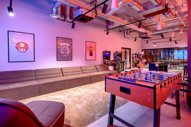 Foosball table couches arcade games pool table gaming room at True Nottingham in Nottingham Student Accommodation