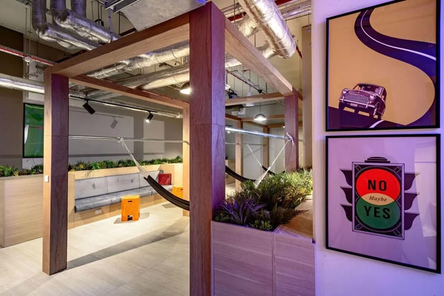 Hammocks lounge seating and plants common area at True Nottingham in Nottingham Student Accommodation