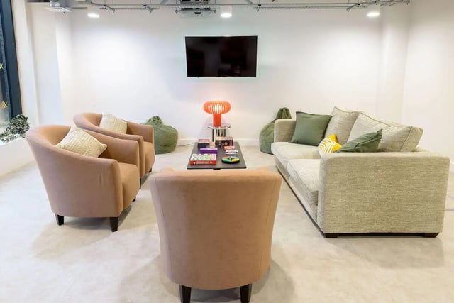Sofa armchairs beanbags television living room at True Sheffield in Sheffield Student Accommodation