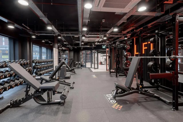 Dumbbells weight benches and squat rack Gym at True Sheffield in Sheffield Student Accommodation