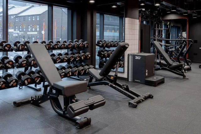 Dumbbell racks weight benches plyo box gym area at True Sheffield in Sheffield Student Accommodation