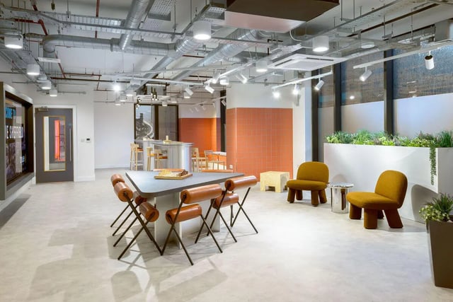 Triangular table chairs bar area and seating area common room at True Sheffield in Sheffield Student Accommodation