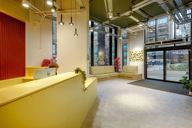 Reception desk sofas and plants living room at True Sheffield in Sheffield Student Accommodation