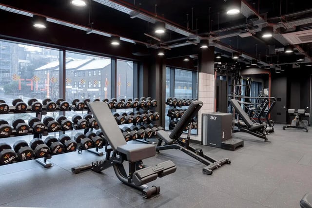 Dumbbells weight benches workout equipment gym at True Sheffield in Sheffield Student Accommodation