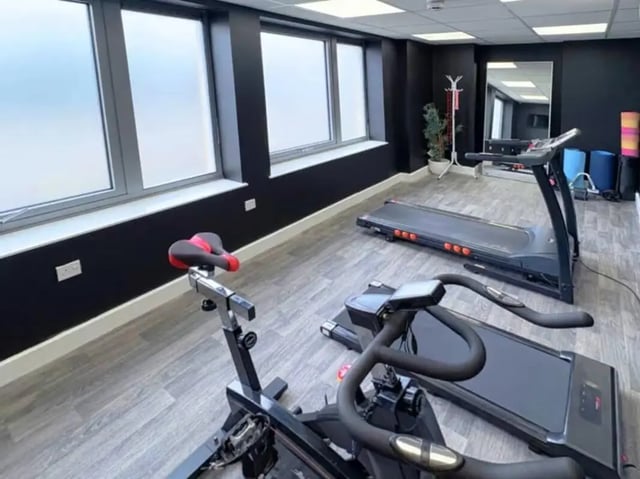 Spin bike and treadmills in gym at The Cube Greenwich in London Student Accommodation