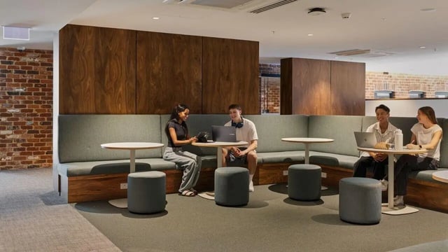 Students studying with laptops on banquette seating area at UniLodge Perth Central in Perth Student Accommodation