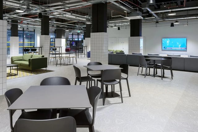 Modern common area with sofas tables and chairs lounge at True Leicester in Leicester Student Accommodation