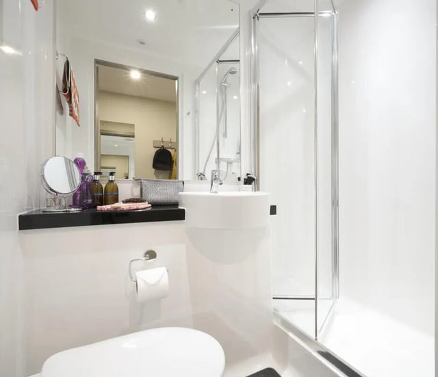 Toilet sink and shower with toiletries bathroom at LIV Student Belfast in Belfast Student Accommodation