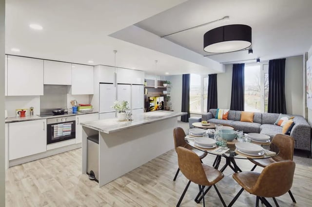 Modern kitchen island dining area and living room at LIV Student Sheffield in Sheffield Student Accommodation