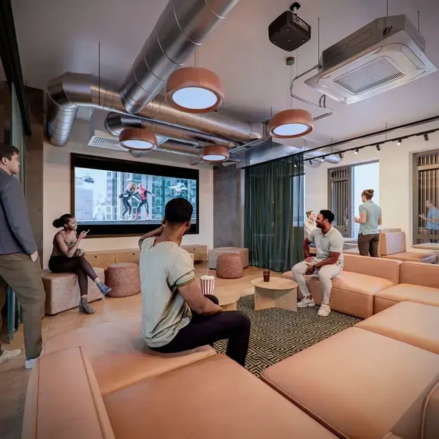 Lounge seating large screen popcorn watching movie living room at Hawthorne House in London Student Accommodation