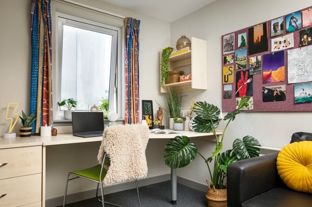 Desk with laptop plants and chair study area at Blackfriars in Glasgow Student Accommodation