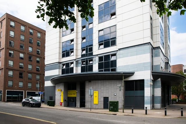 Modern building yellow signage with car exterior at Trafalgar Hall in Portsmouth Student Accommodation