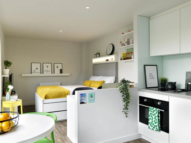 Bed study area with kitchen kitchen at Student Castle Bath in Bath Student Accommodation