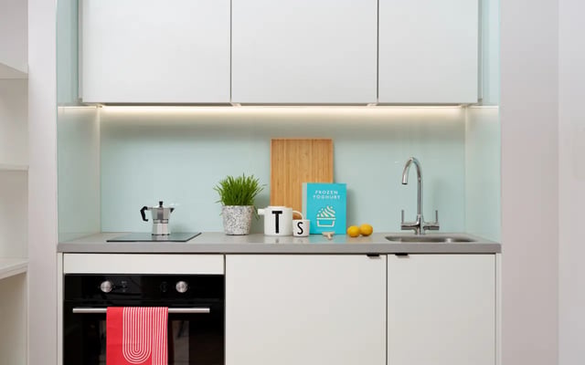 Modern kitchen with oven sink and coffee maker kitchen at Student Castle Durham in Durham Student Accommodation