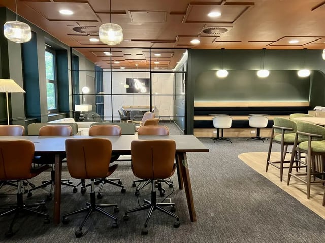Conference table with chairs seating area at Student Castle Reading (New Century Place) in Reading Student Accommodation