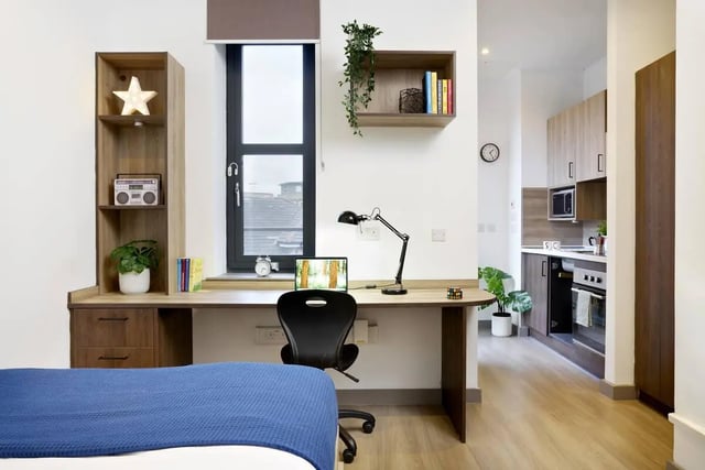 Bed desk lamp laptop kitchen studio apartment at Student Castle Reading (New Century Place) in Reading Student Accommodation