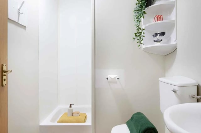 Shower sink toilet towel shelf bathroom at Transom House in Bristol Student Accommodation