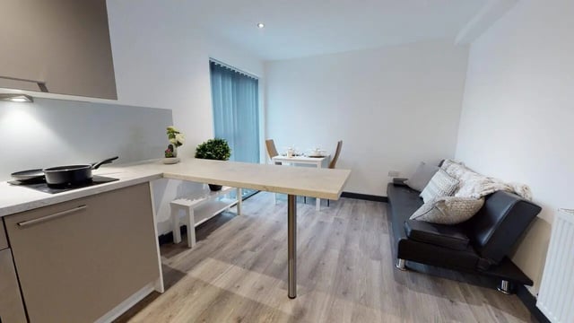 Kitchen dining area and living room living room at Opto village in Luton Student Accommodation