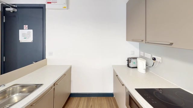 Sink toaster kettle cabinets and door kitchen at Chapel Street - Luton in Luton Student Accommodation