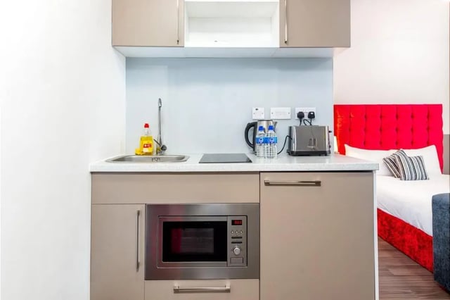 Sink kettle toaster microwave kitchen and bedroom at Chapel Street - Luton in Luton Student Accommodation
