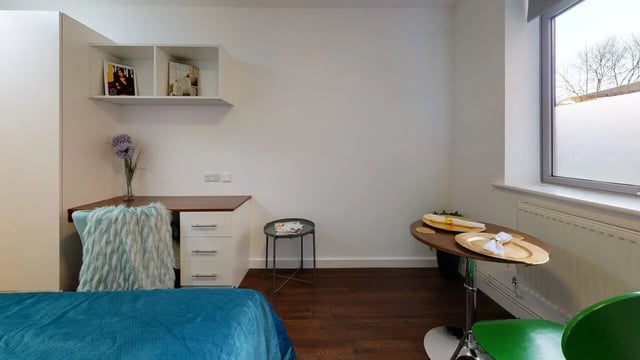Desk chair shelves and table student studio at Park House in Luton Student Accommodation
