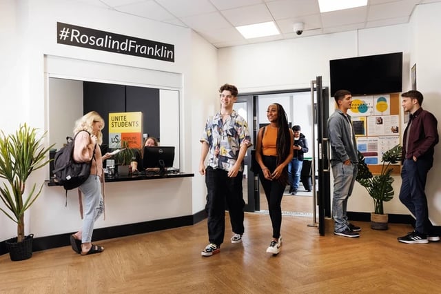 Students at reception area lounge area at Rosalind Franklin Halls in Portsmouth Student Accommodation