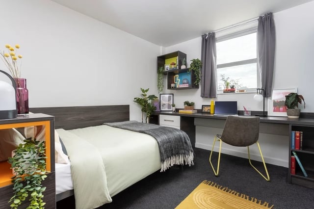 Bed desk shelves and chair study area at Mill Point in Manchester Student Accommodation