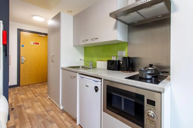 Modern student kitchen with microwave kettle and hob kitchen at Plymouth Cross House in Plymouth Student Accommodation