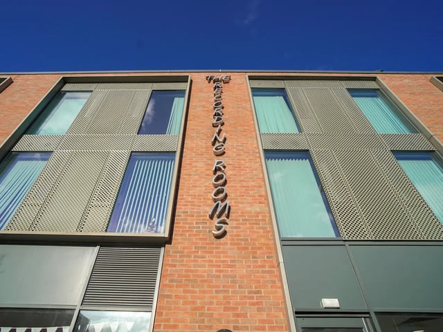 Building with windows and sign exterior at The Recording Rooms in Birmingham Student Accommodation