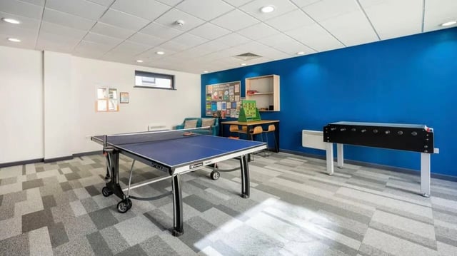 Ping pong table foosball table lounge area at Abode York in York Student Accommodation