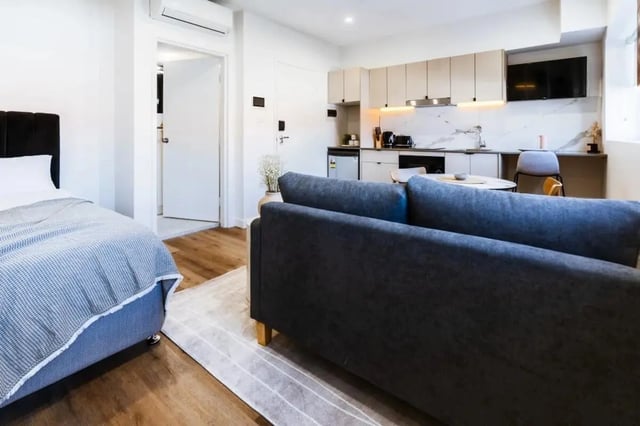 Bed sofa kitchen area and living space at UKO Annandale Tower C in Sydney Student Accommodation