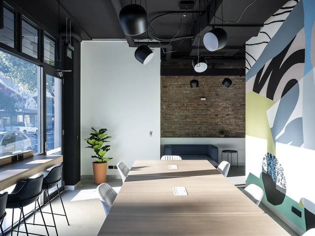 Modern meeting table chairs and plant communal area at UKO Glebe in Sydney Student Accommodation