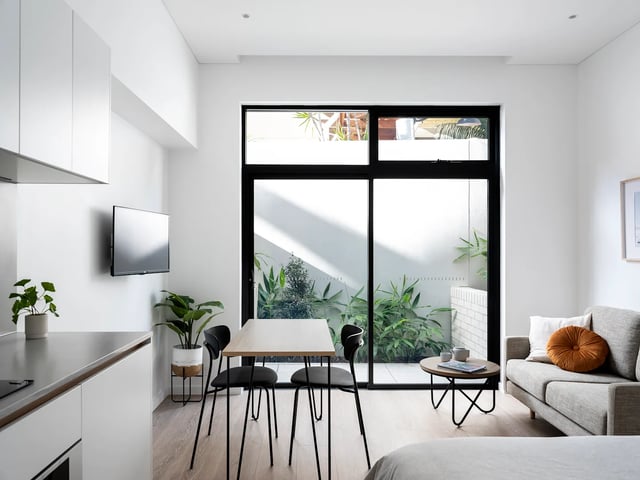 Modern studio apartment with kitchen living and dining areas at UKO Glebe in Sydney Student Accommodation
