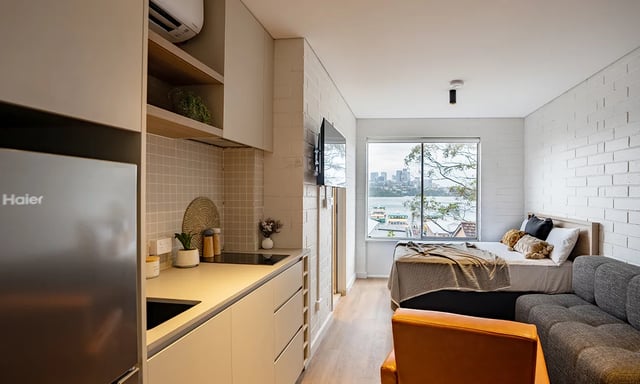 Kitchen bed couch window view living room at UKO Balmain in Sydney Student Accommodation