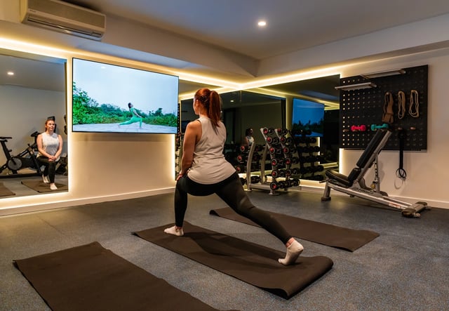 Gym with yoga mats and exercise equipment. Gym at UKO Melbourne Central in Melbourne Student Accommodation