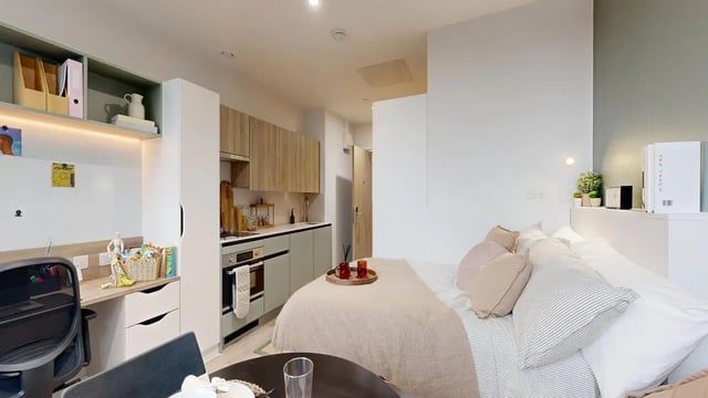 Desk kitchen and bed studio apartment at Yugo Haüs in Birmingham Student Accommodation