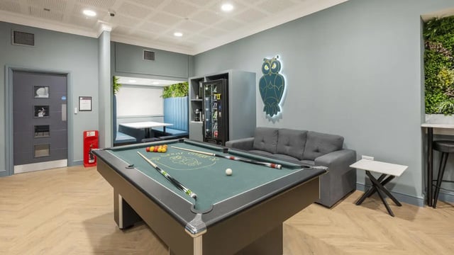 Pool table sofa vending machine common area at 26 Great George Street in Leeds Student Accommodation