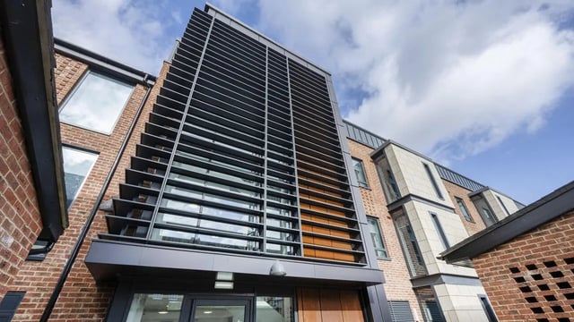 Modern brick building with louvred facade exterior at Waterloo House in York Student Accommodation