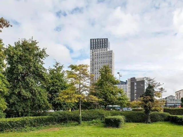 Tall buildings surrounded by green trees exterior at Zenith in Cardiff Student Accommodation