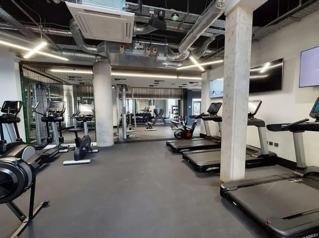 Treadmills cross trainers and rowing machines gym area at COSMOS in Sheffield Student Accommodation